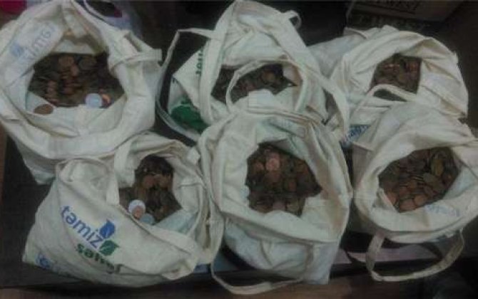 Bakıda zibillikdən 52 kq qəpik tapıldı -  FOTO