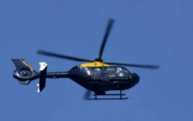 Polis məmuru helikopterlə keçmiş modelin lüt görüntülərini qeydə aldı - FOTOLAR