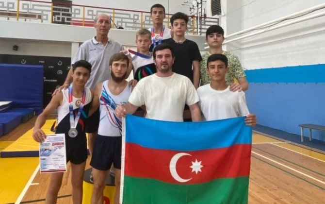 Азербайджанские гимнасты заняли призовые места на турнире по прыжкам на акробатической дорожке в России
