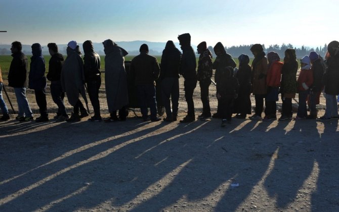 Almaniyada sığınacaq üçün müraciət edənlərin sayı 200 mini keçib