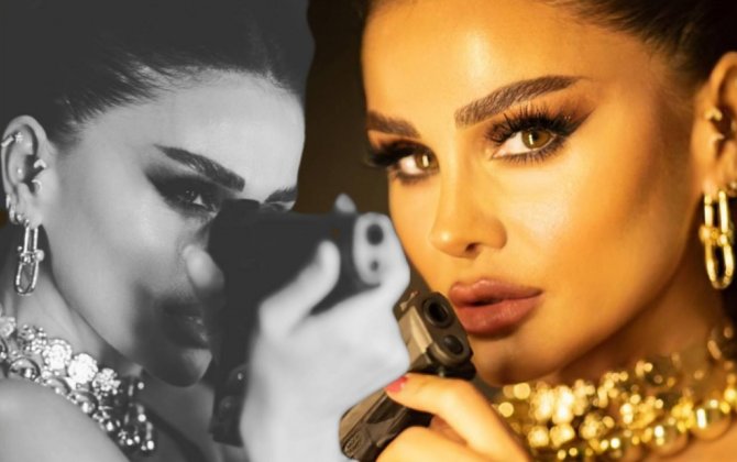 Günel silahla fotosessiya etdirdi