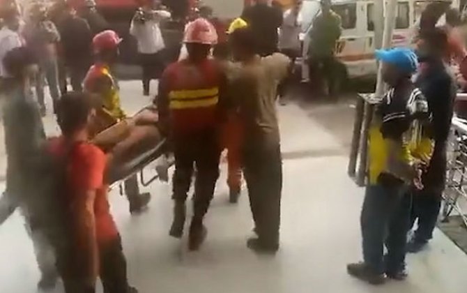 Pakistanda ticarət mərkəzində dəhşətli yanğın: 10-dan çox insan öldü - VİDEO