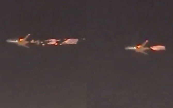 “Boeing 747-8” yük təyyarəsi havada alovlanıb - VİDEO
