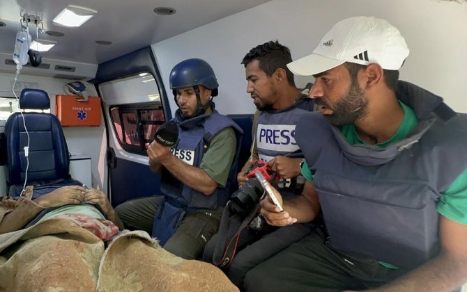 İsrail Qəzzanı bombaladı - Türkiyəli jurnalistlər yaralandı