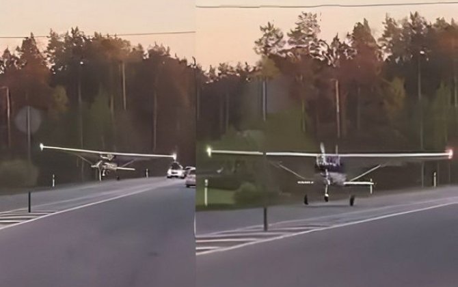 Неисправный самолет сел на дорогу в Латвии - ВИДЕО