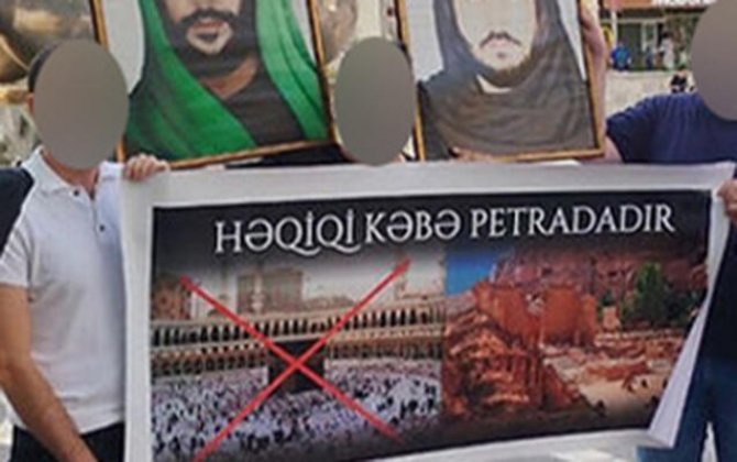 “28 Mall”un qarşısında plakat açan təriqət üzvləri həbs edildi - FOTO