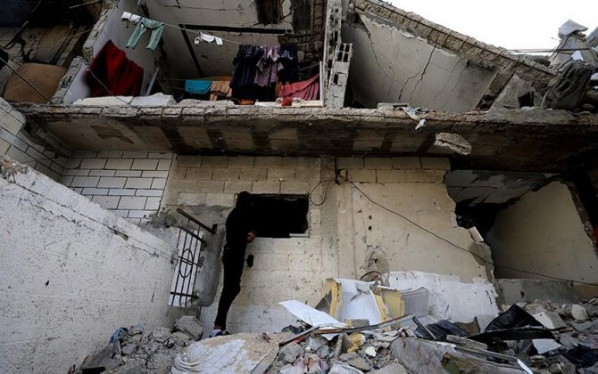 İsrailin Qəzzada yaşayış binasını atəşə tutması nəticəsində 19 nəfər ölüb