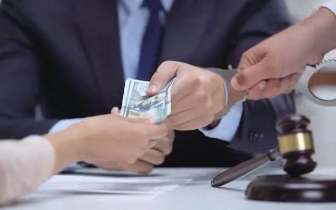 В Гусарском районе задержан чиновник, вымогавший взятки у сельчан