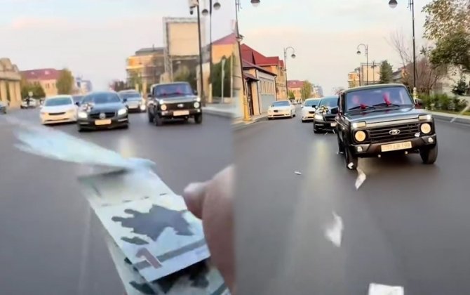 Toy karvanında “avtoş”luq edib yola pul səpdilər - VİDEO