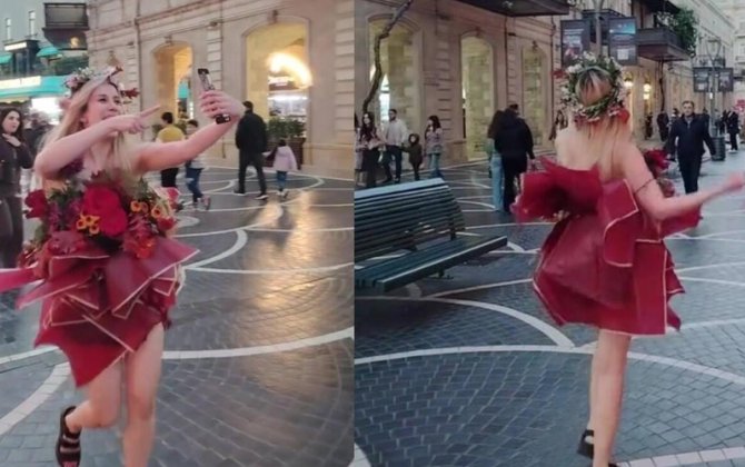 Bakının mərkəzində qəribə geyimdə gəzən qız kimdir? - VİDEO