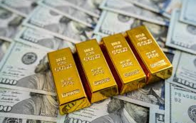 Золото подешевело на фоне неопределенности по ставке ФРС США