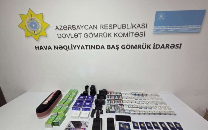 Mobil telefonda gizlədilmiş qızıl külçələr aşkarlanıb - FOTO