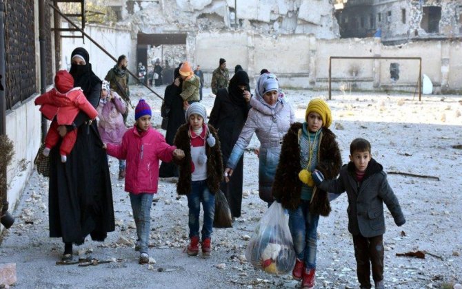 Suriyada əhali toqquşmaların baş verdiyi yerləri tərk edir
