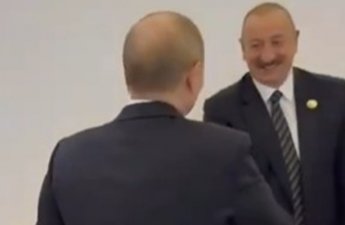 Алиев и Путин обменялись рукопожатием