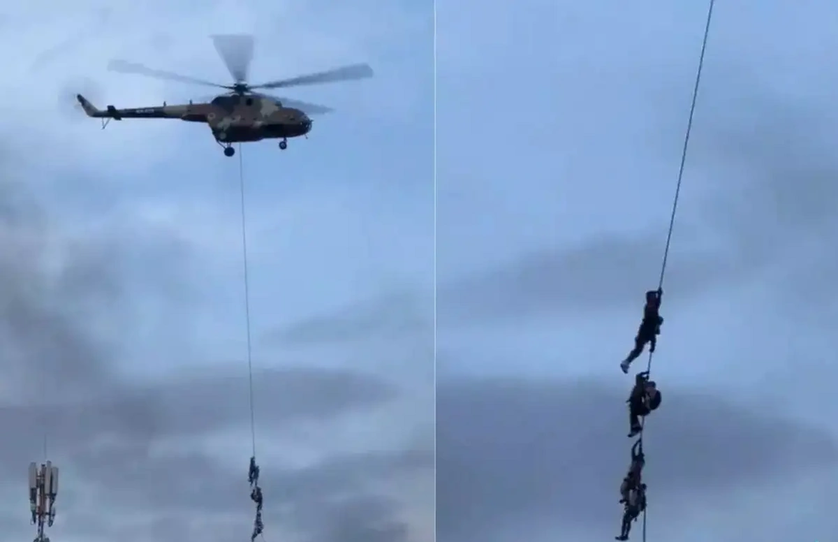 Nazirlər helikopterlərdən endirilən kəndirlərlə təxliyə edildilər - VİDEO