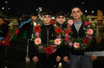 Азербайджанские вольники, успешно выступившие на чемпионате мира, вернулись на Родину