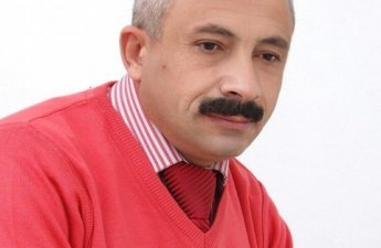 Namiq Dəlidağlı - 55: Qan qoxulu sətirlərdən gül ətirli şeirlərə