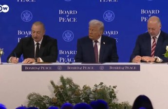 İlham Əliyev sənədi imzaladı - VİDEO