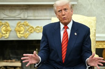 Tramp Çin səfərinin təxirə salındığını bildirib