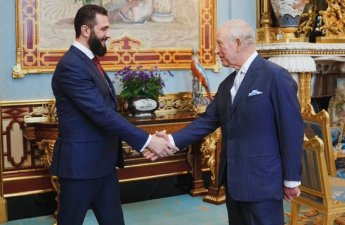 Аш-Шараа на приеме у короля