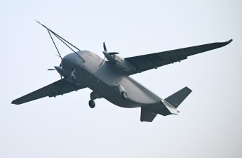 Китай поднял в небо грузовой дрон-ВИДЕО