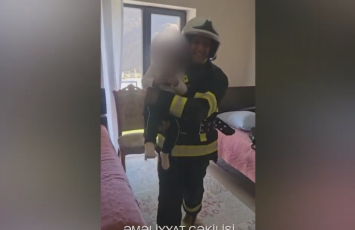 Kəlbəcərdə evdə köməksiz qalan azyaşlı belə xilas edildi - VİDEO