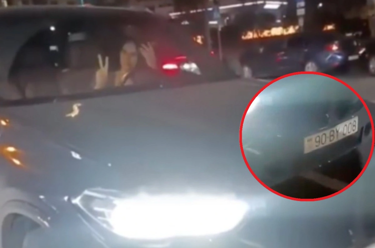 Ağ şəhərdə BMW-nin xanım sürücüsü motosikletçini vurdu - VİDEO