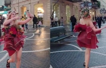 Bakının mərkəzində qəribə geyimdə gəzən qız kimdir? - VİDEO