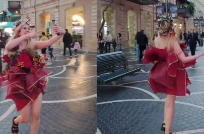 Bakının mərkəzində qəribə geyimdə gəzən qız kimdir? - VİDEO